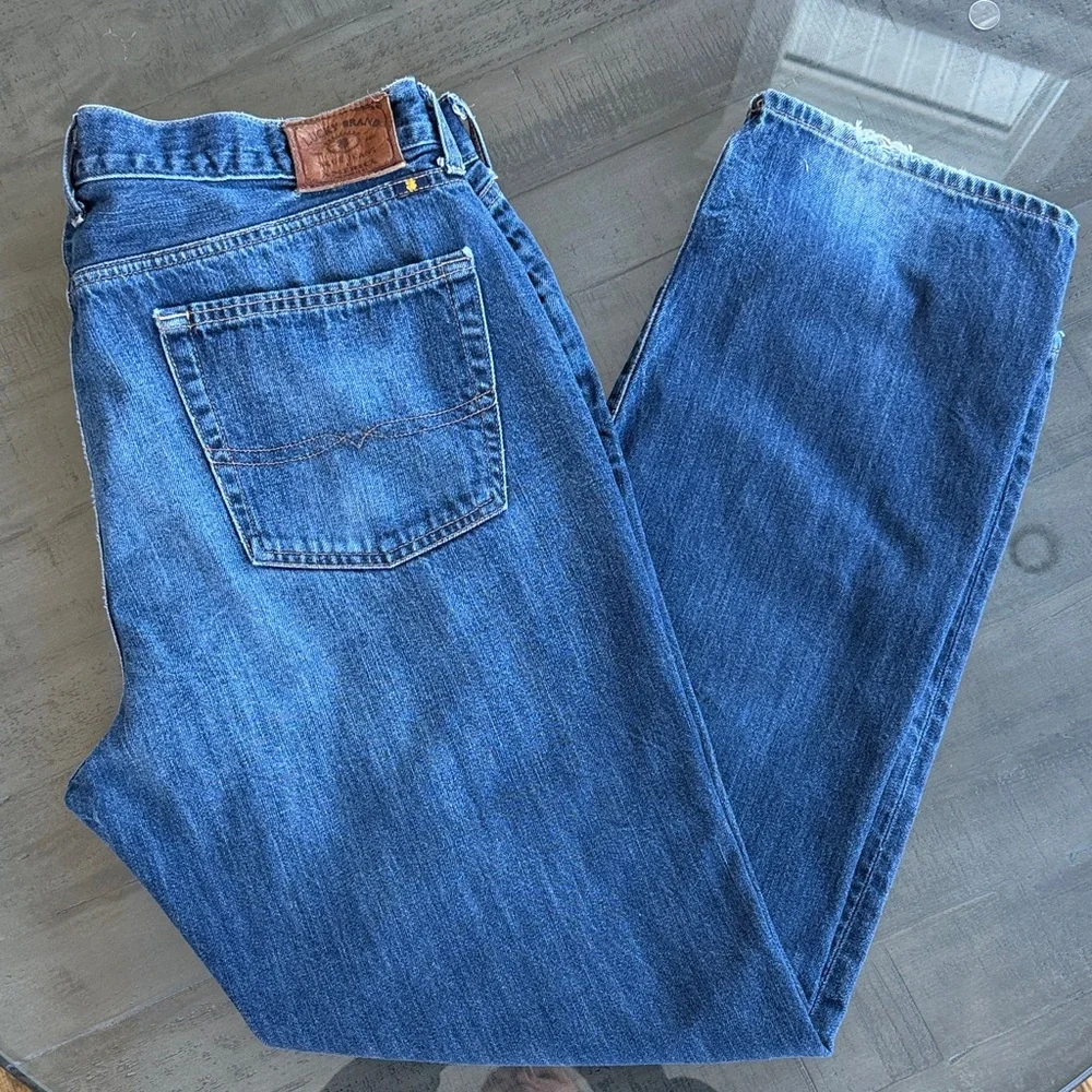 Lucky Brand Men's 363 Vintage Straight Jeans. Size 40 x 32. Distressed back hem